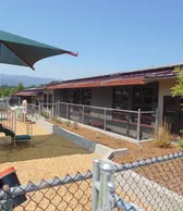 Play area with shade structure